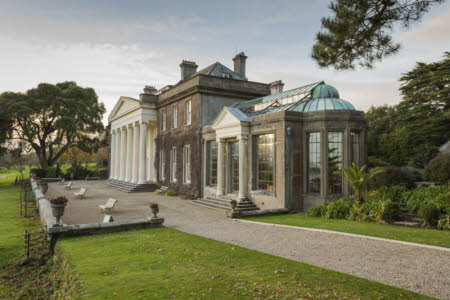 The entrance front and orangery at Trelissick, Cornwall
